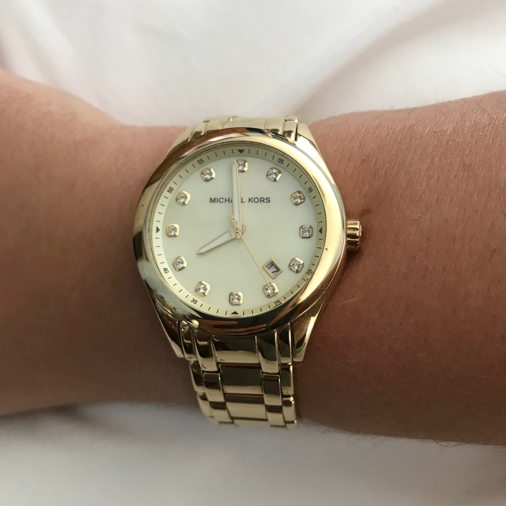 Gold MK watch